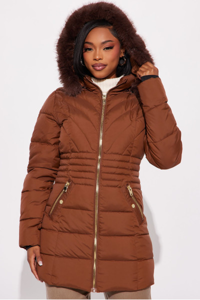 Подовжена стьобана куртка 